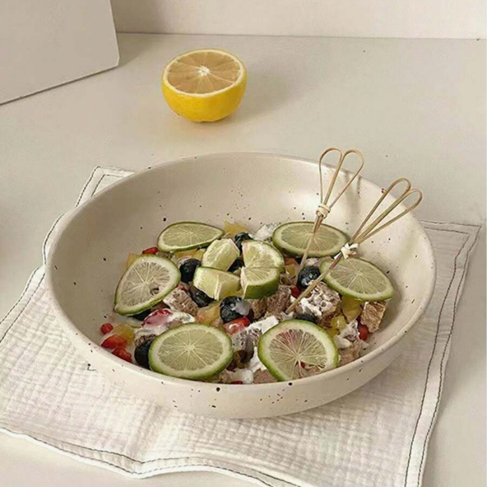 1 round beige splash ink salad plate