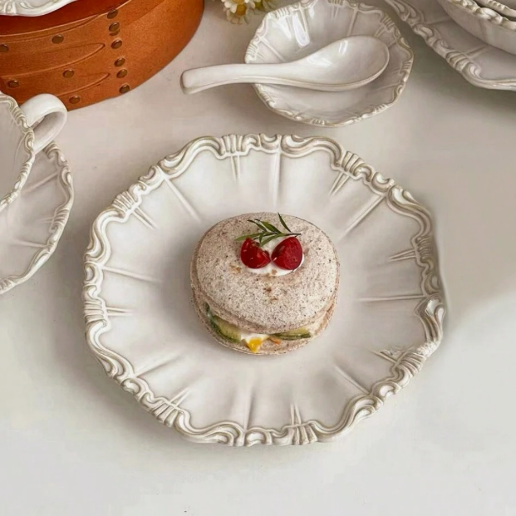 1 vintage embossed ivory ceramic dinner plate